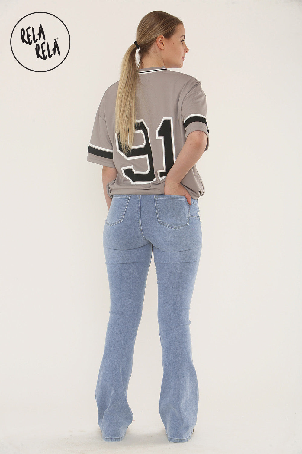 Flared Stretchy Pull On Jeans in Mid Blue