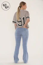 Flared Stretchy Pull On Jeans in Mid Blue
