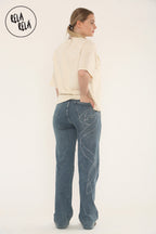 Viral Stretchy Relaxed Mid-Waist Rhinestone Bow Detail Jeans in Denim Blue
