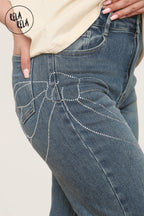 Viral Stretchy Relaxed Mid-Waist Rhinestone Bow Detail Jeans in Denim Blue