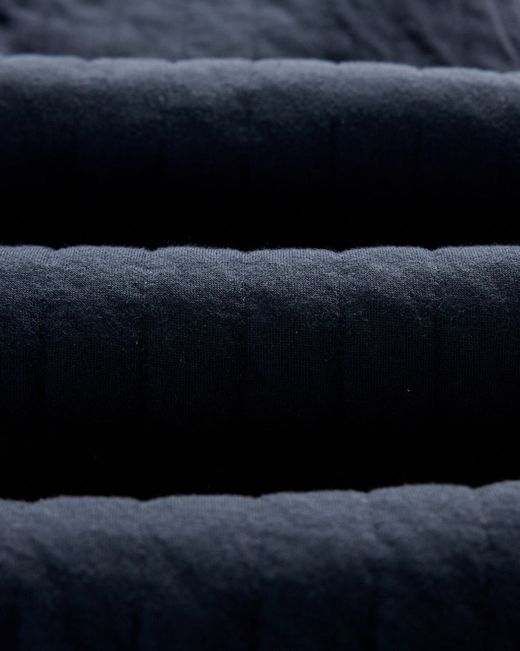 The Apres Pant in Heather Midnight Quilted Jersey