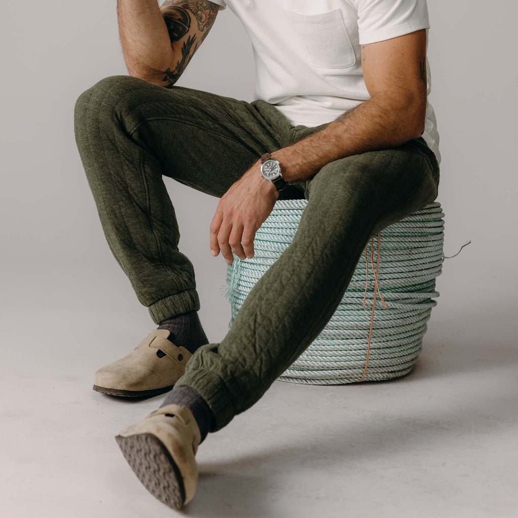 The Apres Pant in Heather Fatigue Olive Quilted Jersey
